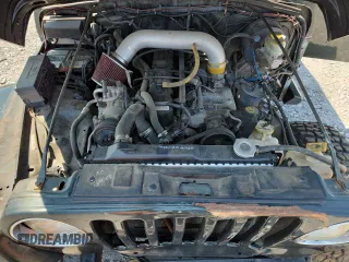 1997 Jeep Wrangler Sahara with VIN 1J4FY49S3VP519387, listed as a Copart auction lot 63822395 with 187,884 mi miles and Salvage title. Bid and sale history available at DreamBid. Image 12.