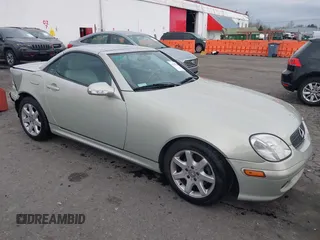 2002 Mercedes-Benz SLK 230 Kompressor with VIN WDBKK49F82F260243, listed as a IAAI auction lot 41518786 with 118,026 mi miles and . Bid and sale history available at DreamBid. Image 1.