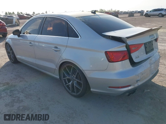 2015 Audi A3 Premium z VIN WAUACGFF5F1015240, wystawiony jako IAAI lot #42032916 z przebiegiem 129 656 mil mil oraz . Historia ofert i sprzedaży dostępna na DreamBid. Obrazek 3.