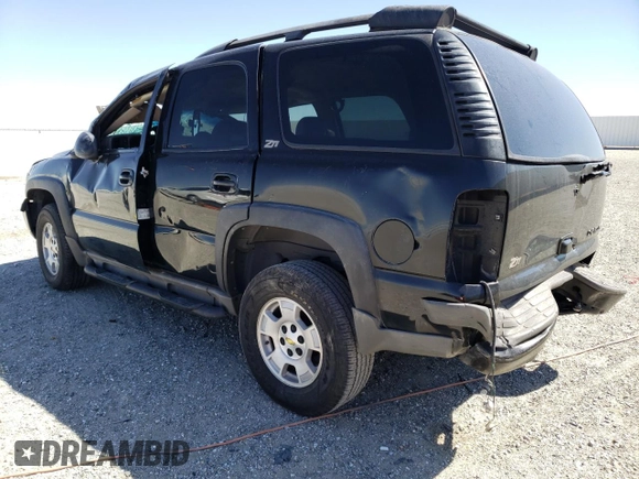 2002 Chevrolet Tahoe LT z VIN 1GNEK13T42R152851, wystawiony jako Copart lot #67958403 z przebiegiem 257 989 mil mil oraz Szkoda całkowita • Salvage title. Historia ofert i sprzedaży dostępna na DreamBid. Obrazek 2.