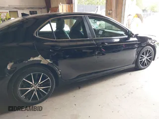 2021 Toyota Camry SE Nightshade with VIN 4T1G11AK6MU580771, listed as a IAAI auction lot 40042967 with 106,579 mi miles. Bid and sale history available at carsss.com. Image 6.