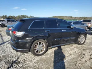 2015 Jeep Grand Cherokee Summit with VIN 1C4RJFJG0FC700014, listed as a Copart auction lot 42981765 with 144,937 mi miles and Salvage Title. Bid and sale history available at DreamBid. Image 3.