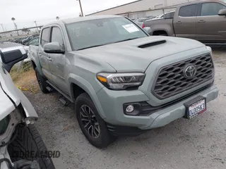 2022 Toyota Tacoma SR5 with VIN 3TMAZ5CN2NM164692, listed as a IAAI auction lot 42332371 with 46,065 mi miles and . Bid and sale history available at DreamBid. Image 1.