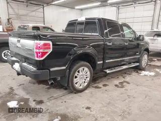 2011 Ford F-150 XLT with VIN 1FTFW1ET1BFD35317, listed as a IAAI auction lot 41322730 with 188,432 mi miles. Bid and sale history available at carsss.com. Image 4.