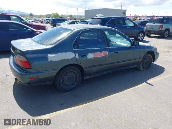 1997 Honda Accord LX with VIN JHMCD5639VC020185, listed as a IAAI auction lot 42072191 with 263,967 mi miles and . Bid and sale history available at carsss.com. Image 4.