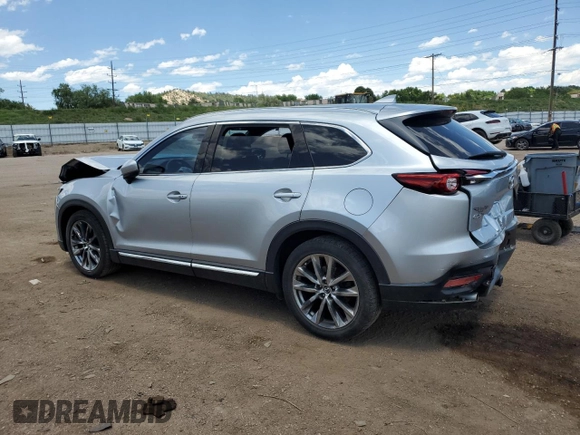 2016 Mazda CX-9 Grand Touring с VIN JM3TCADY2G0121026, выставлен на аукционе Copart как лот 60518105 с пробегом 104 923 миль миль и Списание • Salvage title. История ставок и продаж доступна на DreamBid. Изображение 2.
