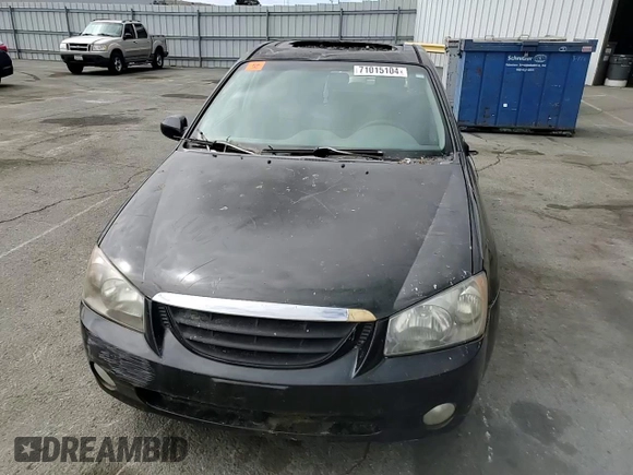 2005 Kia Spectra with VIN KNAFE162655074198, listed as a Copart auction lot 71015104 with 200,819 mi miles and Salvage Title. Bid and sale history available at DreamBid. Image 11.