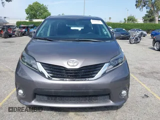 2015 Toyota Sienna SE with VIN 5TDXK3DCXFS680767, listed as a IAAI auction lot 42237107 with 105,912 mi miles and . Bid and sale history available at DreamBid. Image 13.