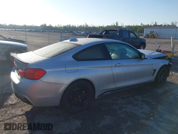 2015 BMW 4 Series 428i xDrive z VIN WBA3N9C56FK246118, wystawiony jako IAAI lot #41923623 z przebiegiem 113 207 mil mil oraz . Historia ofert i sprzedaży dostępna na DreamBid. Obrazek 4.