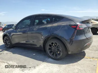 2024 Tesla Model Y Long Range with VIN 7SAYGDEEXRA237667, listed as a Copart auction lot 58260635 with Not provided miles and Salvage title. Bid and sale history available at DreamBid. Image 2.