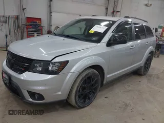 2013 Dodge Journey SXT with VIN 3C4PDCBBXDT661479, listed as a IAAI auction lot 42055731 with 151,963 mi miles. Bid and sale history available at carsss.com. Image 2.