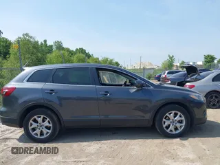 2014 Mazda CX-9 Touring z VIN JM3TB3CA4E0431520, wystawiony jako IAAI lot #42514932 z przebiegiem 119 837 mil mil oraz . Historia ofert i sprzedaży dostępna na DreamBid. Obrazek 13.