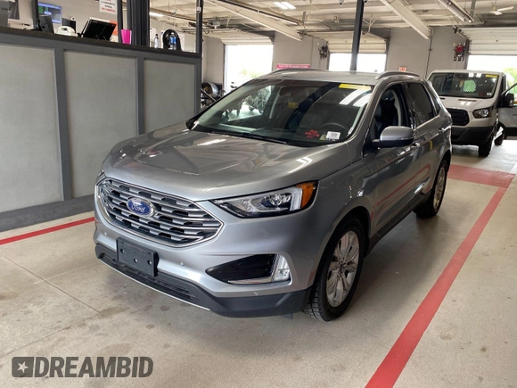 2020 Ford Edge Titanium with VIN 2FMPK3K92LBA30525, listed as a IAAI auction lot 42284108 with 101,779 mi miles and . Bid and sale history available at DreamBid. Image 1.