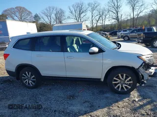 2021 Honda Pilot EX-L with VIN 5FNYF6H52MB062365, listed as a IAAI auction lot 41664771 with 42,393 mi miles. Bid and sale history available at carsss.com. Image 14.