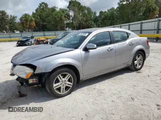 2013 Dodge Avenger SXT with VIN 1C3CDZCB4DN689363, listed as a Copart auction lot 58935055 with 141,536 mi miles and Salvage title. Bid and sale history available at DreamBid. Image 1.
