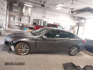 2015 Infiniti Q50 Premium with VIN JN1BV7AR6FM398836, listed as a IAAI auction lot 41836719 with 57,804 mi miles. Bid and sale history available at carsss.com. Image 13.