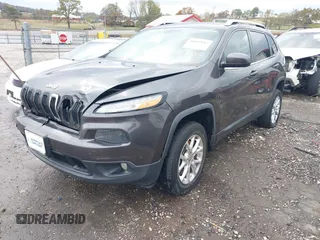 2014 Jeep Cherokee Altitude with VIN 1C4PJMCB7EW232678, listed as a IAAI auction lot 40812147 with 105,828 mi miles. Bid and sale history available at carsss.com. Image 18.