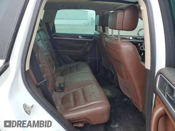 2012 Volkswagen Touareg Sport with VIN WVGEF9BP2CD010668, listed as a Copart auction lot 55306485 with 166,255 mi miles and Clean Title. Bid and sale history available at DreamBid. Image 11.