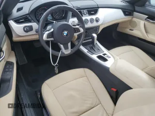 2010 BMW Z4 sDrive30i with VIN WBALM5C55AE377124, listed as a Copart auction lot 77951244 with 18,842 mi miles and Salvage Title. Bid and sale history available at carsss.com. Image 8.