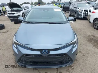 2023 Toyota Corolla Hybrid LE with VIN JTDBCMFE8PJ013271, listed as a IAAI auction lot 42099797 with 14,080 mi miles and . Bid and sale history available at carsss.com. Image 13.