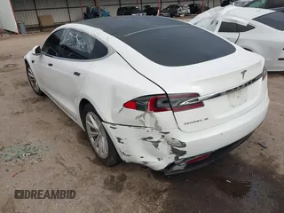2016 Tesla Model S 70 with VIN 5YJSA1E12GF172359, listed as a IAAI auction lot 42107587 with Not provided miles and . Bid and sale history available at DreamBid. Image 3.