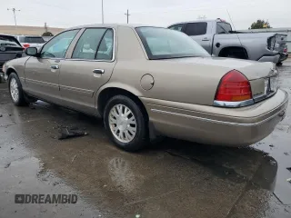 2005 Ford Crown Victoria LX z VIN 2FAFP74W05X122403, wystawiony jako Copart lot #45305825 z przebiegiem 202 381 mil mil oraz Szkoda całkowita • Salvage title. Historia ofert i sprzedaży dostępna na DreamBid. Obrazek 2.