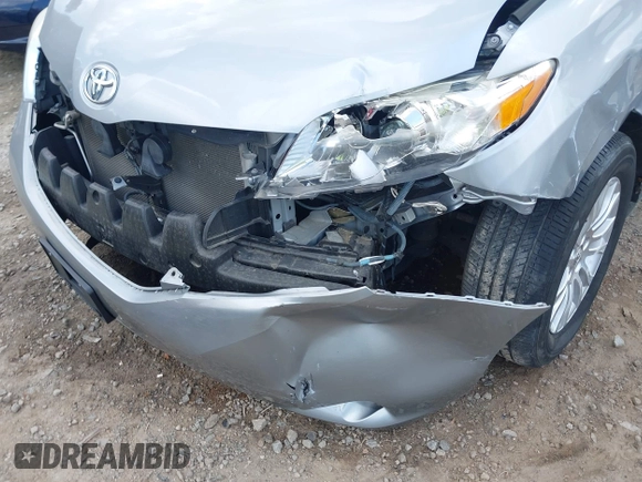 2015 Toyota Sienna XLE with VIN 5TDYK3DC7FS659864, listed as a IAAI auction lot 41958112 with 121,257 mi miles and . Bid and sale history available at DreamBid. Image 18.