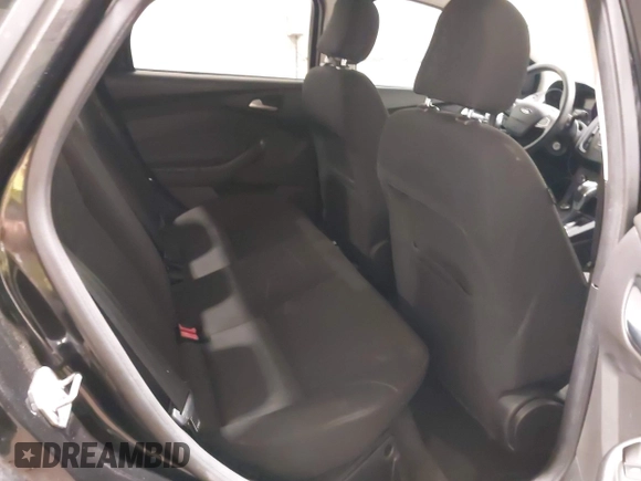 2015 Ford Focus SE with VIN 1FADP3F29FL203084, listed as a IAAI auction lot 42357973 with 99,002 mi miles and . Bid and sale history available at DreamBid. Image 8.