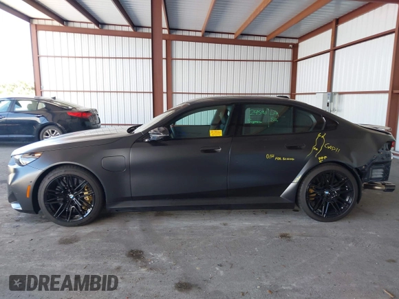 2025 BMW 5 Series with VIN WBS83FK04SCU11874, listed as a IAAI auction lot 42543784 with 4,517 mi miles and . Bid and sale history available at DreamBid. Image 14.