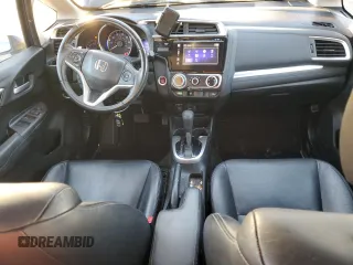 2016 Honda Fit EX-L with VIN 3HGGK5H84GM703545, listed as a Copart auction lot 84183844 with 97,709 mi miles and Salvage title. Bid and sale history available at DreamBid. Image 8.