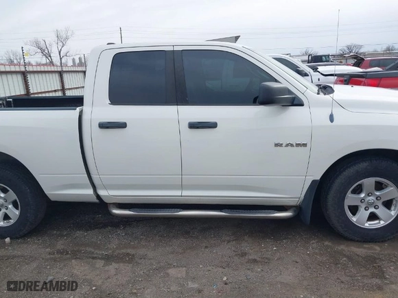 2009 Dodge Ram 1500 SLT with VIN 1D3HB18PX9S700623, listed as a IAAI auction lot 41617857 with 231,055 mi miles. Bid and sale history available at carsss.com. Image 13.