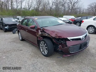 2014 Toyota Avalon Limited with VIN 4T1BK1EB5EU124568, listed as a IAAI auction lot 41996280 with 102,440 mi miles. Bid and sale history available at carsss.com. Image 1.