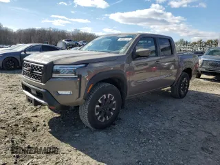 2024 Nissan Frontier PRO-4X with VIN 1N6ED1EK2RN656885, listed as a Copart auction lot 46604165 with 4,390 mi miles and Salvage Title. Bid and sale history available at carsss.com. Image 1.