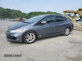2013 Honda Insight EX with VIN JHMZE2H77DS002844, listed as a Copart auction lot 60973555 with 113,113 mi miles and Salvage title. Bid and sale history available at DreamBid. Image 1.