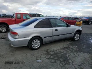 2000 Honda Civic DX z VIN 1HGEJ6226YL055469, wystawiony jako Copart lot #80469814 z przebiegiem Nie podano mil oraz Szkoda całkowita • Salvage title. Historia ofert i sprzedaży dostępna na DreamBid. Obrazek 3.