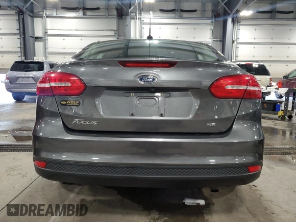 2017 Ford Focus SE with VIN 1FADP3F21HL205754, listed as a Copart auction lot 63632985 with 96,797 mi miles and Salvage title. Bid and sale history available at DreamBid. Image 6.