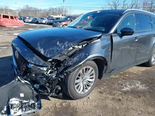 2024 Mazda CX-90 Preferred with VIN JM3KKBHDXR1146779, listed as a IAAI auction lot 41628645 with 14,744 mi miles and . Bid and sale history available at DreamBid. Image 6.