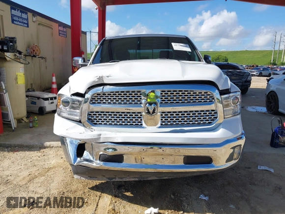 2018 Ram 1500 Laramie with VIN 1C6RR6VT1JS250301, listed as a IAAI auction lot 42736798 with 93,532 mi miles and . Bid and sale history available at DreamBid. Image 12.
