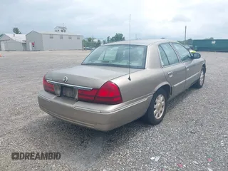 2005 Mercury Grand Marquis LS Premium z VIN 2MEFM75W25X661590, wystawiony jako IAAI lot #42534626 z przebiegiem 113 450 mil mil oraz . Historia ofert i sprzedaży dostępna na DreamBid. Obrazek 4.