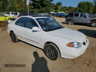 2000 Hyundai Elantra GLS z VIN KMHJF35F8YU922503, wystawiony jako Copart lot #71063234 z przebiegiem 209 706 mil mil oraz Czysty tytuł • Clean title. Historia ofert i sprzedaży dostępna na DreamBid. Obrazek 4.