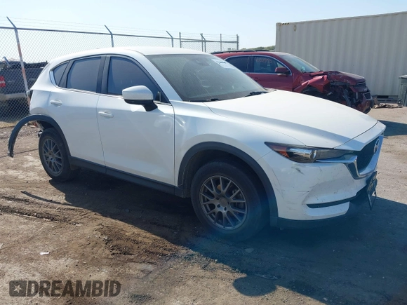 2017 Mazda CX-5 Sport with VIN JM3KFABL5H0124725, listed as a IAAI auction lot 40487298 with 103,889 mi miles. Bid and sale history available at carsss.com. Image 1.