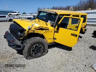 2015 Jeep Wrangler Unlimited Rubicon Hard Rock with VIN 1C4BJWFG0FL561769, listed as a Copart auction lot 48905815 with 223,549 mi miles and Clean title. Bid and sale history available at DreamBid. Image 1.