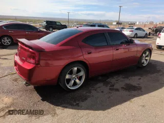 2006 Dodge Charger SRT-8 with VIN 2B3LA73W56H369414, listed as a Copart auction lot 49818765 with 117,563 mi miles and Salvage Title. Bid and sale history available at DreamBid. Image 3.