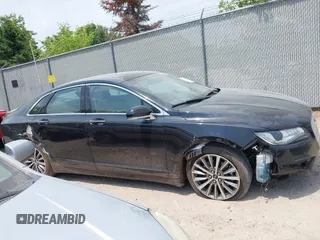2020 Lincoln MKZ Hybrid Premiere with VIN 3LN6L5KU6LR614453, listed as a IAAI auction lot 42440643 with 76,384 mi miles and . Bid and sale history available at DreamBid. Image 14.