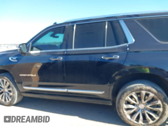 2021 GMC Yukon Denali with VIN 1GKS2DKL1MR135771, listed as a IAAI auction lot 41403680 with 61,772 mi miles. Bid and sale history available at carsss.com. Image 14.
