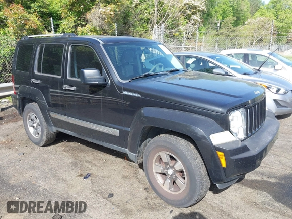 2008 Jeep Liberty Sport with VIN 1J8GP28KX8W227953, listed as a IAAI auction lot 42049588 with 310,901 mi miles. Bid and sale history available at carsss.com. Image 1.