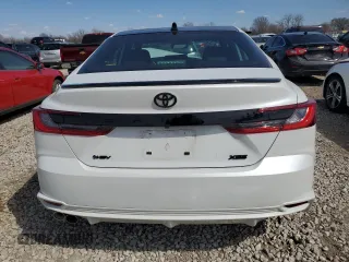 2025 Toyota Camry LE with VIN 4T1DAACKXSU052793, listed as a Copart auction lot 50166545 with 8,577 mi miles and Salvage Title. Bid and sale history available at DreamBid. Image 6.