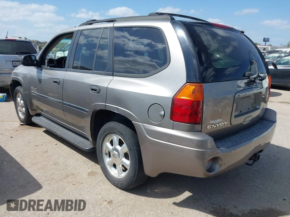 2006 GMC Envoy SLT with VIN 1GKDS13S462185122, listed as a IAAI auction lot 41778816 with 220,974 mi miles. Bid and sale history available at carsss.com. Image 3.