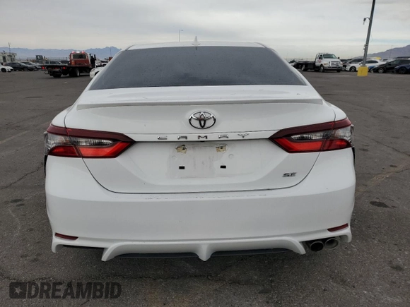 2024 Toyota Camry SE with VIN 4T1G11AK3RU844763, listed as a Copart auction lot 86654084 with 9,822 mi miles and Salvage Title. Bid and sale history available at carsss.com. Image 6.