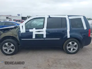 2012 Honda Pilot EX-L with VIN 5FNYF4H52CB070811, listed as a IAAI auction lot 41938672 with 156,446 mi miles and . Bid and sale history available at DreamBid. Image 14.